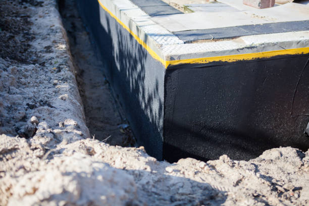 Professional Exterior Waterproofing technician working in Farmingdale, NJ